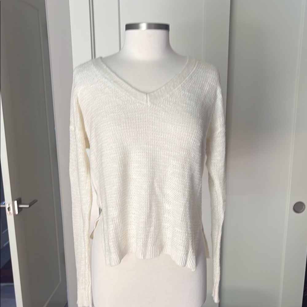 Elegant Cream V-Neck Sweater by banana republic. New. Linen, viscose and nylon.